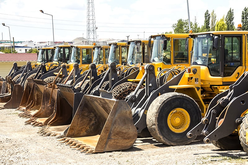 skidsteers lined up in a row